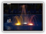 Pool fountain by night